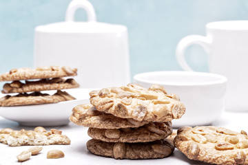 Peanut cookies in a light blue and white kitchen setting