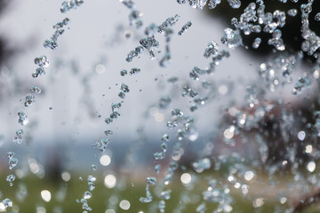 The gush of water of a fountain. Splash of water in the fountain, abstract image