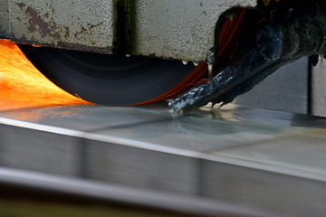 Processing of metal by grinding on a flat grinding machine, at a machine-building enterprise.