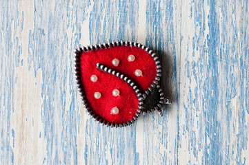 Brooch handmade in the form of ladybug