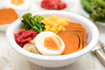 healthy bowl with vegetables and boiled egg