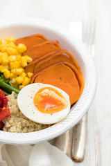 healthy bowl with vegetables and boiled egg