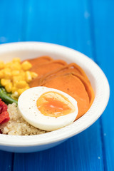 healthy bowl with vegetables and boiled egg