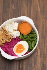 vegetables bowl with boiled egg in bowl