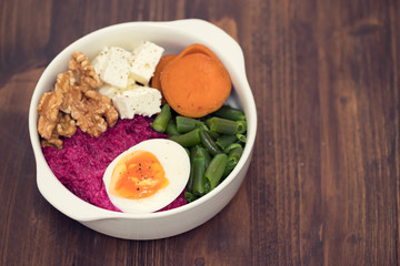 vegetables bowl with boiled egg in bowl