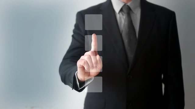 Businessman using whiteboard and touching checkbox