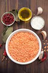red dry lentil in white bowl