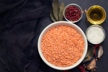 red dry lentil in white bowl