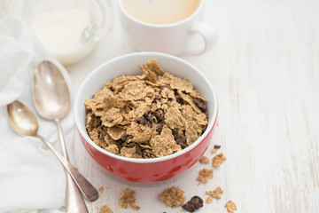cereals with chocolate cereals in red bowl
