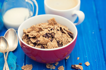 cereals with chocolate cereals in red bowl
