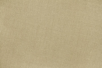 Fototapeta na wymiar Beige woolen plane fabric with without waves, background smooth tissue.