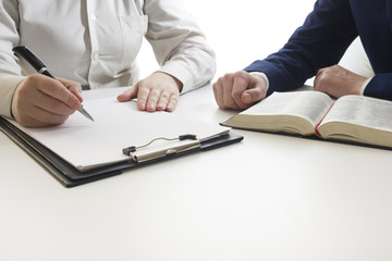 Law, advice and Legal services concept. Lawyer and attorney having team meeting at law firm.
