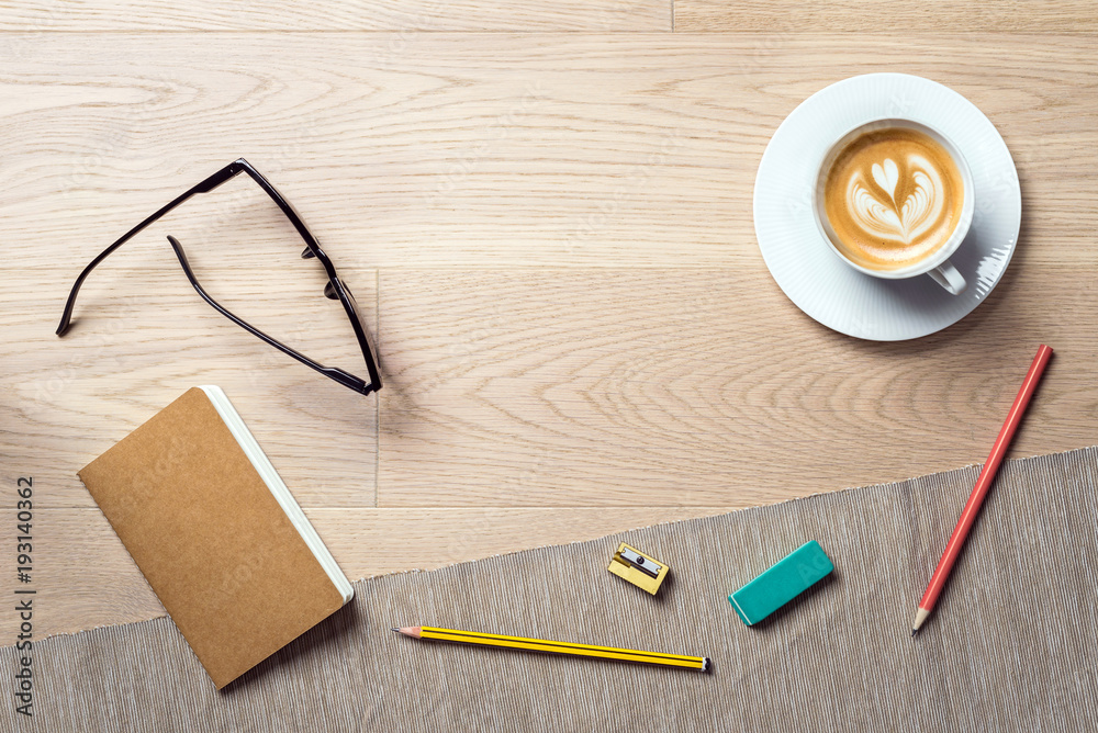 Wall mural notebook and coffee as flat lay and template from above