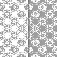 White and gray set of floral seamless patterns