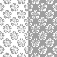 White and gray set of floral seamless patterns