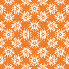 White floral ornament on orange. Seamless pattern