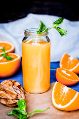 healthy morning with orange juice in bottle on kitchen backgroun