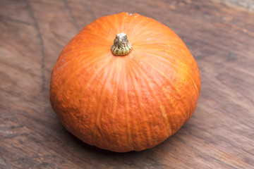 Giants pumpkin on wooden background