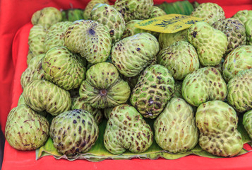 Fototapeta premium custard apple fruit with selective for sale at the market . 