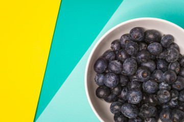 blueberries fruit in bowl, Colorful back ground, Healthy concept