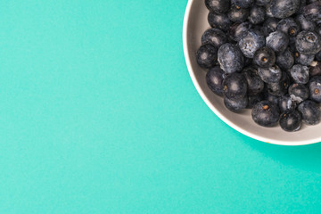 blueberries fruit in bowl, Colorful back ground, Healthy concept