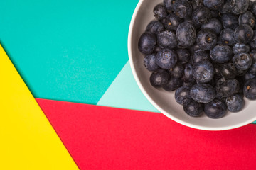 blueberries fruit in bowl, Colorful back ground, Healthy concept