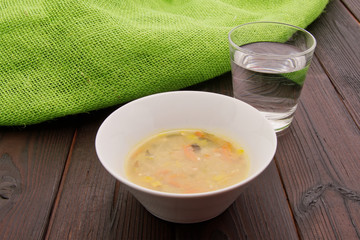 Vegetable soup with buckwheat on a table