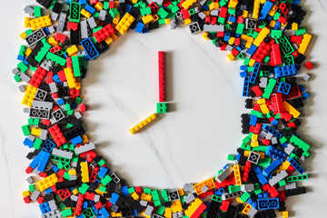 clock toy construction background. Toy Clock.