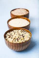 Three bowls with different varieties of rice