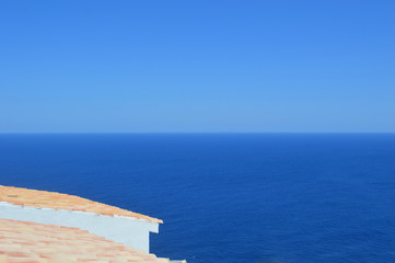 Sunny sea view with a small roof peace