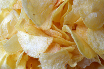 Chips background. Fried potatoes.
