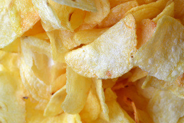 Chips background. Fried potatoes.