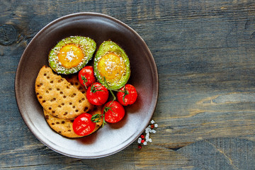 Avocado baked with eggs