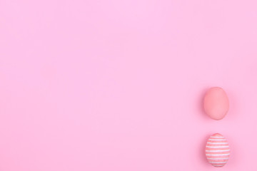 Happy Easter Day. Pink tradition easter eggs on pink background