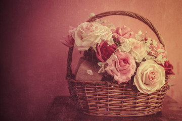 love flower rose in the basket vintage retro with dirty grain texture overlay for background.