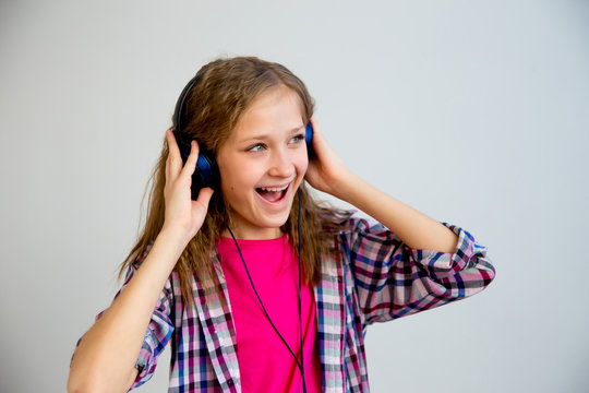 Girl singing in headphones