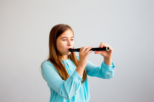 Girl playing flute