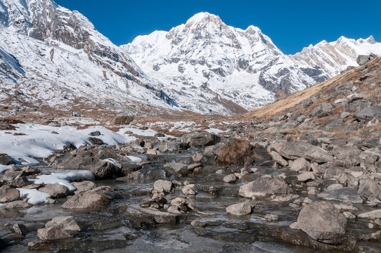 small stream in the himalayan mountains