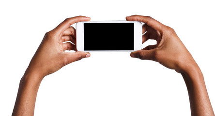 Hands holding mobile smartphone with blank screen
