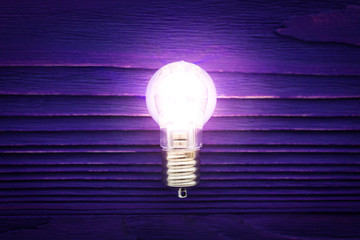 Light from lamp on purple wall. Image use for Sparked new ideas for modern business