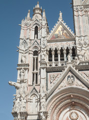Fototapeta na wymiar West facade of Siena Cathedral