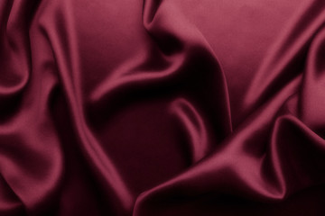 Fototapeta premium Elegant red satin silk with waves, abstract background