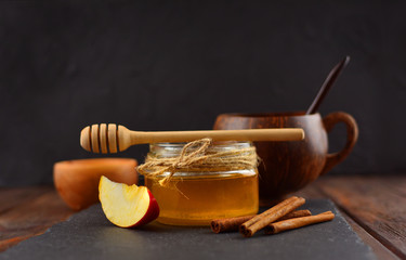 Beautiful honey on a rustic wooden table. Natural and healthy food.