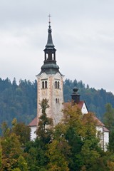 Fototapeta na wymiar Ancient baroque church on Bled Island in Slovenia