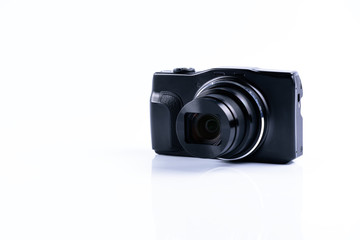 Digital black compact camera on white background or isolated