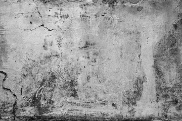 Wall fragment with scratches and cracks