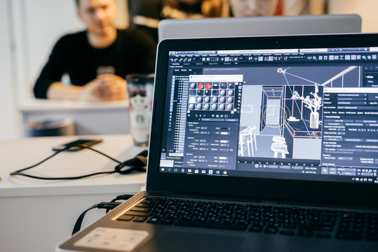 People in the office designer architects working on a project on laptops