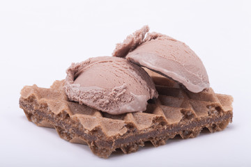 Ice cream with waffle on light background
