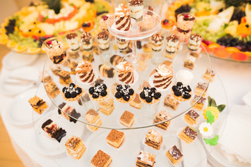 Different kinds of baked sweets on a buffet