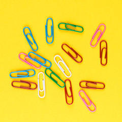 paperclips isolated on yellow background